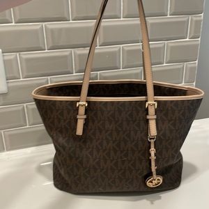 Real Michael Kors handbag, medium size with lots of room and pockets!